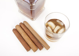 Whiskey glass and cigar. Isolated on white background  
