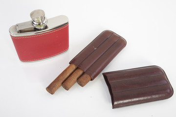 cigar and flask with alcohol  