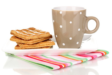 Cup of tea and cookies isolated on white
