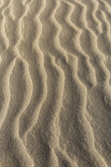 Hintergrund - Wellen im Sand - Hochformat