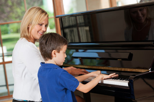 Piano teacher and student