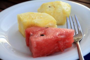 Watermelon and pineapple on plate