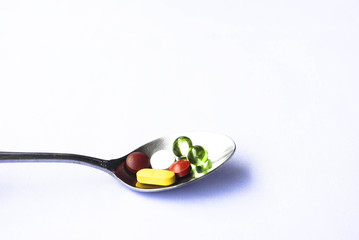 Fototapeta premium Silver Spoon with Pills