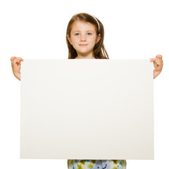 Portrait of a beautiful little girl holding blank sign