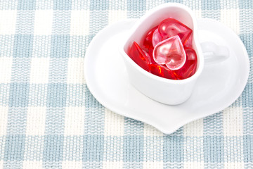 Red and pink heart and heart shaped coffee cup