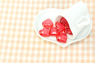 Red heart and heart shaped coffee cup
