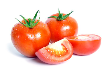 Tomatoes with water drops on the white
