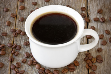 cup of coffee on wood background