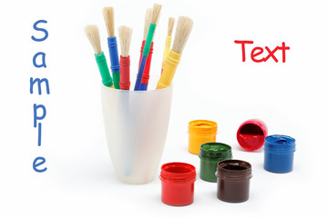 Brushes and paints isolated on a white background.