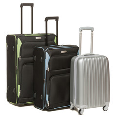Three large travel bags standing over white background