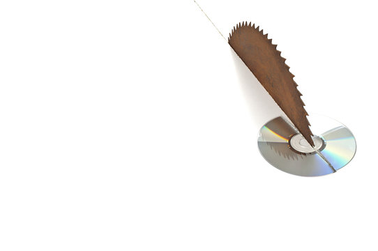 Data destruction concept -  buzzsaw destroying a DVD