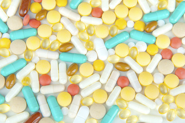 Bright background of various pills and capsules