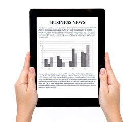 female hands holding a tablet