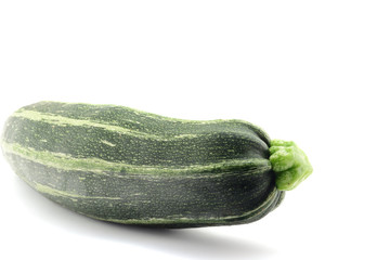 Single green squash isolated over white