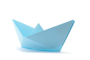 Single blue paper boat isolated over white background