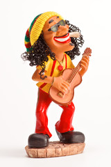 resin figure depicting a Rastafarian smoking marijuana