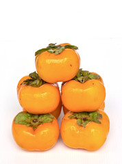 orange persimmon on white background