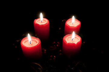 Christmas advent wreath with burning candles
