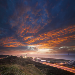 seacoast sunset with street lights