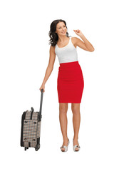 hitch-hiking woman with suitcase