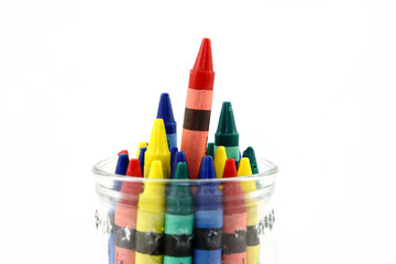 Obraz premium Assorted Colors Of Crayons In A Clear Jar