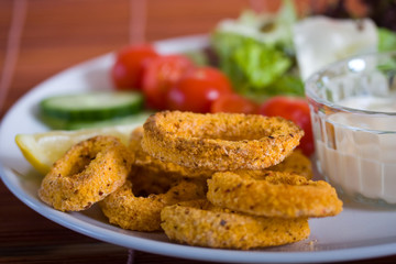 Fried calamari with vegetables