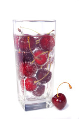 Sweet cherry in glass with water