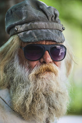 Bearded Man with Cap & Sun Glasses