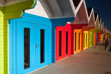 Beach huts at sunrise in Great Britain