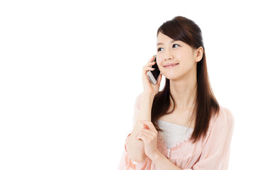 Beautiful young woman using a mobile phone. Portrait of asian.