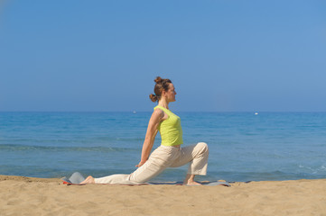 Fototapeta na wymiar joga on the beach