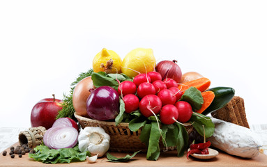 Healthy food. Fresh vegetables and fruits on a wooden board.