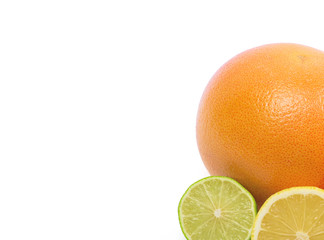 Image of a fresh whole lime, lemon and orange isolated on white