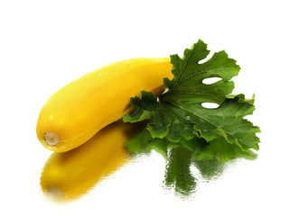 yellow zucchini with leaf - obrazy, fototapety, plakaty