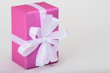 gift with white ribbon