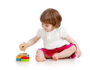 child girl playing with educational toy