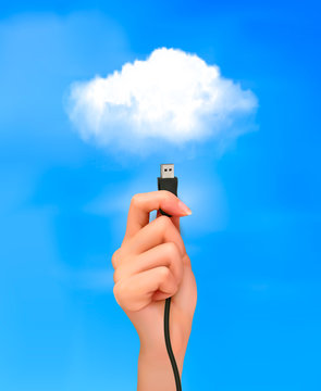 Hand holding cable  Concept of cloud computing