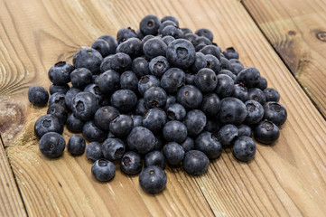 Heap of Blueberries on wood
