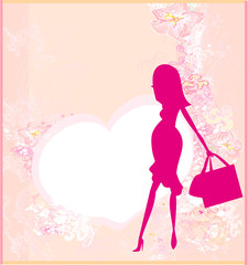 Beautiful pregnant woman on shopping for her new baby- abstract
