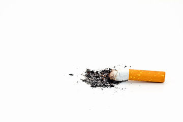 Single cigarette butt with ash isolated on white background
