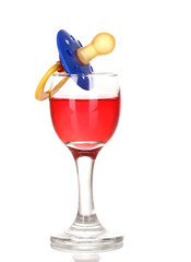 Baby dummy with alcoholic beverage isolated on white