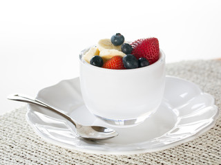 Breakfast of blueberries strawberries banana