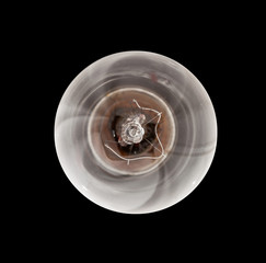 Incandescent light bulb lit from above