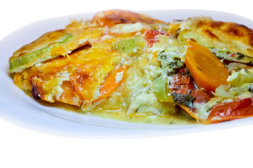 Roasted vegetables with sauce on the plate