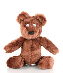Sitting bear toy isolated on white