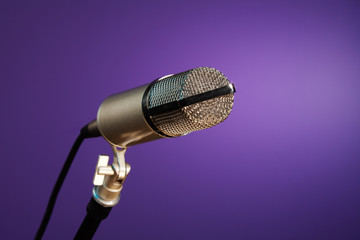 metallic microphone on purple
