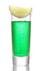 glass of absinthe and lime isolated on white - obrazy, fototapety, plakaty
