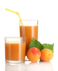 two glasses of apricot juice and apricots with leaf isolated