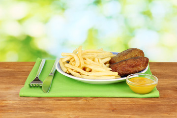 Potatoes fries with burgers