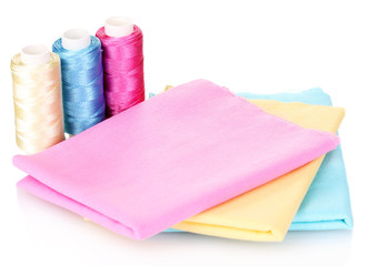 Sewing accessories and fabric isolated on white